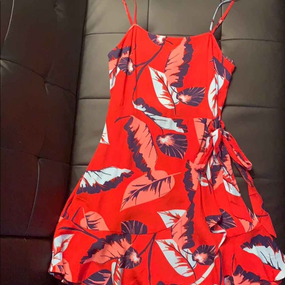 Express red dress with colored leafs